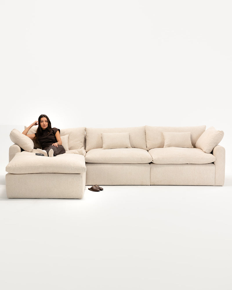 Cloud L-shape sofa by Wasilaah in a lounge