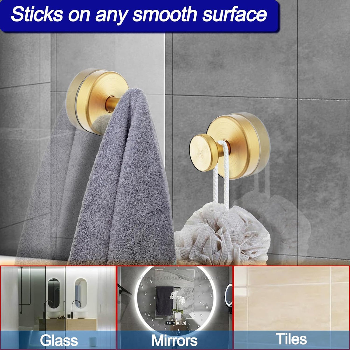 A modern towel hanger is mounted on a smooth bathroom surface, showcasing a gray towel hanging from a stylish gold holder. The image highlights the hangers sleek design and versatility for use on glass, mirrors, and tiles.